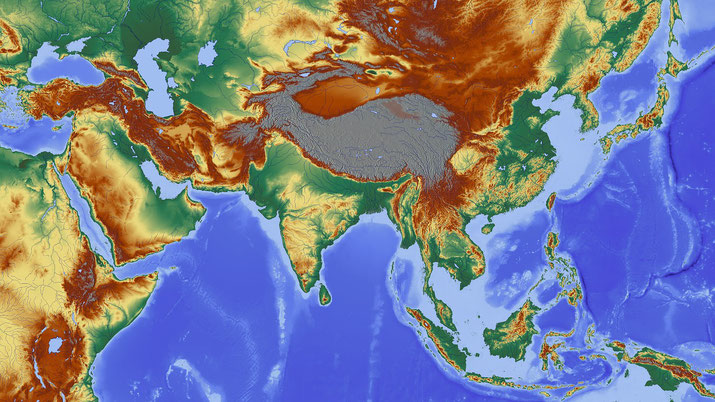 Topographic map of Asia and surrounding regions, highlighting elevation changes with color gradients from mountains to lowlands and oceans.
