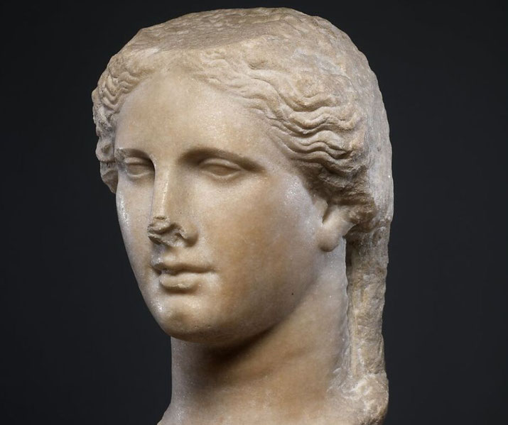 Marble portrait head, likely of Arsinoe II, blending classical Greek features with Ptolemaic royal iconography.
