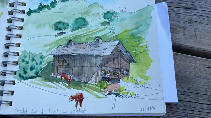 Cette aquarelle, niveau débutant, montre un chalet en bois sur le Mont du Lacéat, entouré de verdure. Des vaches et une chèvre paissent paisiblement à côté. Les collines verdoyantes et le ciel bleu clair complètent cette scène sereine de montagne