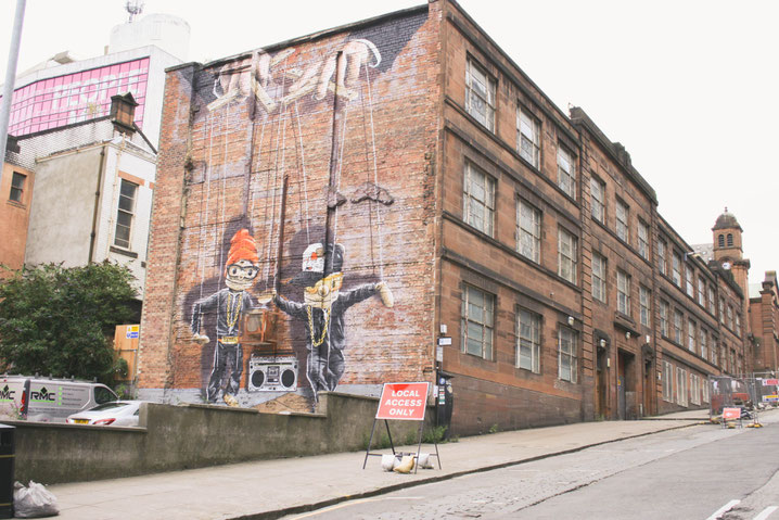 Glasgow Scotland UK ofpenguinsandelephants of penguins and elephants graffiti Marionettes