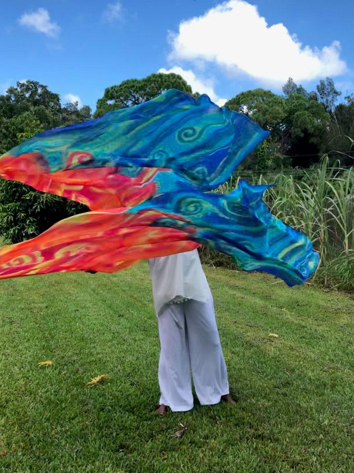 Swirling orange fire and deep swirling water on a silk flag