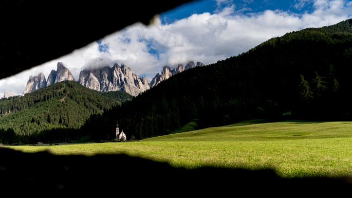 Looking at St. Johann church and Geislerspitzen in Southern Tyrol