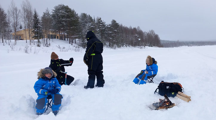 Ice Fishing in a frozen river. Picture: Polarguide and Logistics