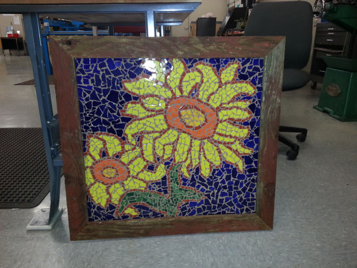 A mosaic made by my friend Kimball. The frame is made of barn wood.