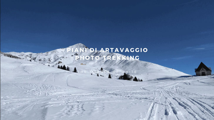 Photo of the snow-covered Piani di Artavaggio with Mount Sodadura in the background