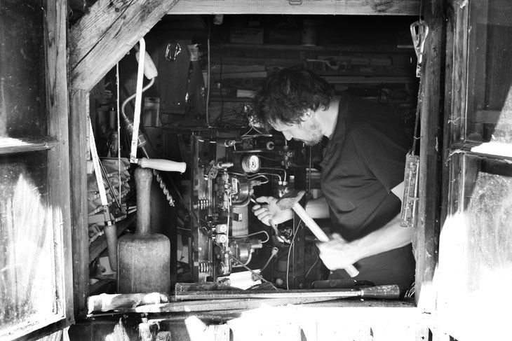 The Meister at repairing an espresso machine
