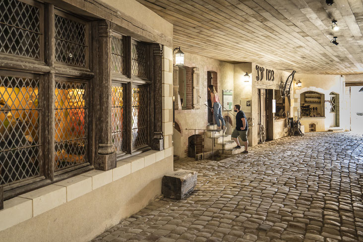 La rue pavée et ses échoppes d'artisans - Photo F. Crampon