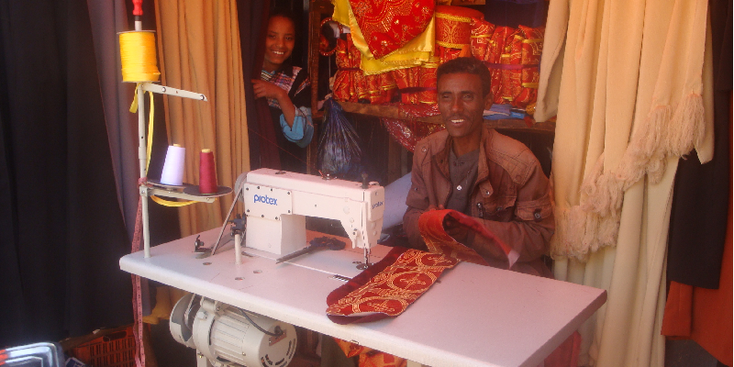 Addis-Ababa-kleermaker-Piazza-wijk-Ethiopië-Markt-hoofdstad-bus