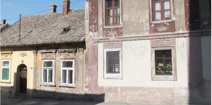 Novi-Sad-afgebladderd-huis-Servië