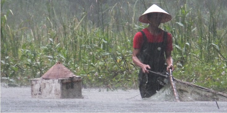 Tam-Coc-Ninh-Binh-visser-water-regen-Vietnam