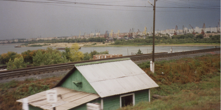 Trans-Mongolië-expres-trein-rails-Perm-huis-Rusland