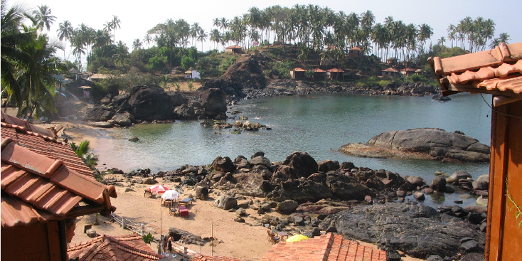 Palolem-Goa-India-palmbomen-zon-strand-Portugees-boten
