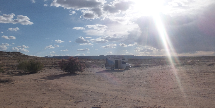 Lone-Rock-Beach-Lake-Powell-zand-strand-ondergaande-zon-Verenigde-Staten