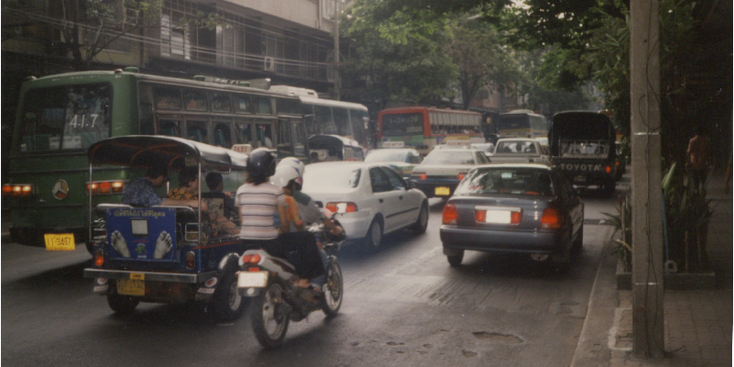 Charoen-Krung-Road-Chinatown-Bangkok-scooter-tuktuk-bus-transport-Thailand