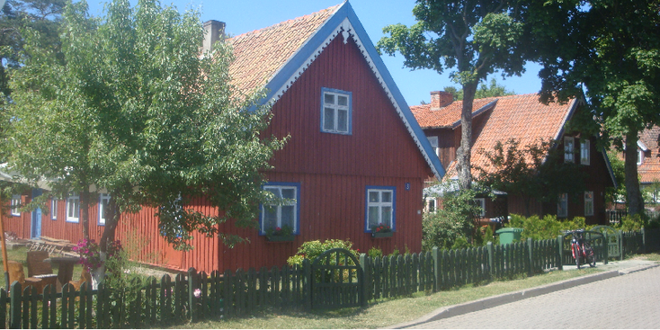 Nida-Curonion-Spit-nationaal-park-gekleurde-houten-huizen-Litouwen