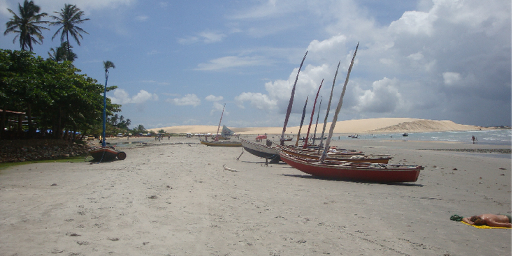 Jericoacoara-strand-boten-palmbomen-duin-Brazilië