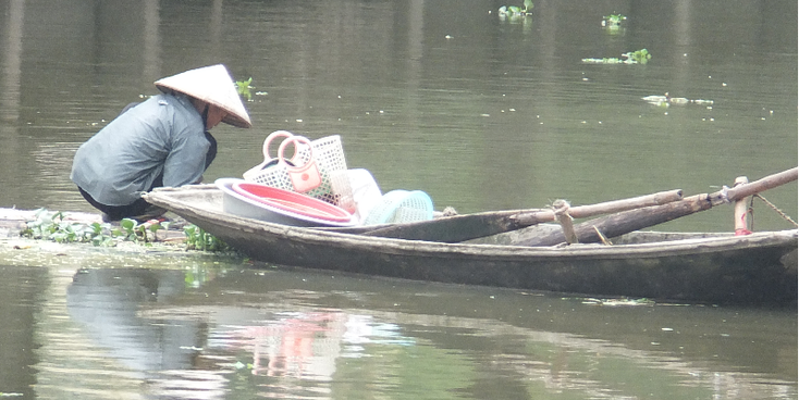 Phat-Diem-rivier-boot-originele-hoed-Vietnam