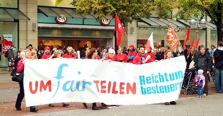 Protest für eine Umverteilung von Reichtum