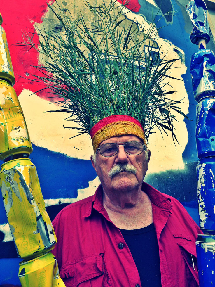 The last Mohicans by © Pedro Meier, Fluxus DADA Climate Change Performance: Bamboo, trash alu beer cans, Homage to the indigenous Amazon peoples and Native American Indians. Gesamtkunstwerk, Graffiti Campus Attisholz Solothurn. Visarte – SIKART Zürich