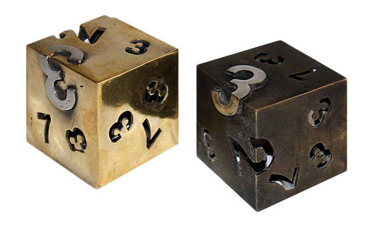 Main view of Dado bronze sculpture by Paolo Grassi, showing cut-out numbers on patinated surface – edition 0/8
