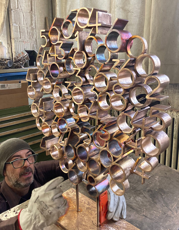 Tobia sculpture by Paolo Grassi during bronze finishing at the foundry – abstract conceptual work in progress