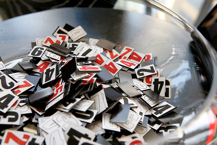 Close-up of magnetic numbers used in the participatory artwork by Paolo Grassi at UBS SA, Ascona