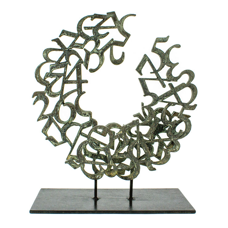 Love bronze sculpture by Paolo Grassi with circular numeric pattern forming the word LOVE. From the project From “0” to Infinity.