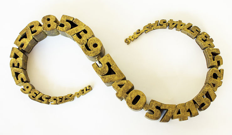 Aerial view of the bronze infinity sculpture by Paolo Grassi with numeric structure