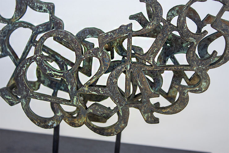love sculpture closeup oxidized bronze detail – paolo grassi