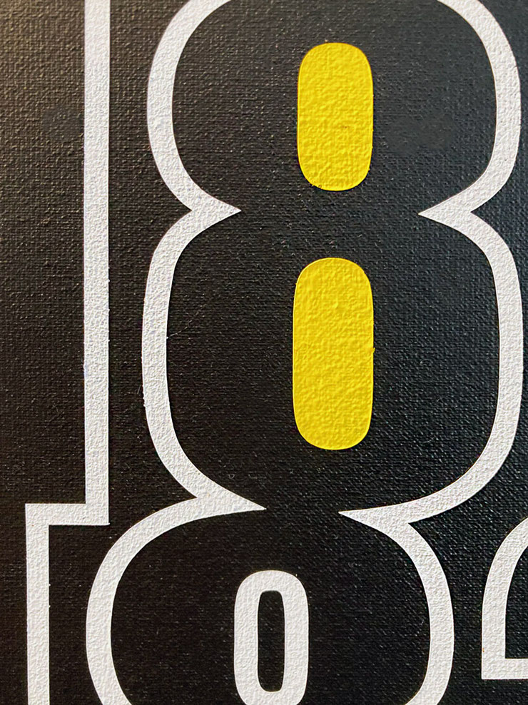 Close-up of Paolo Grassi’s The City – number 8 with yellow central zero on textured black canvas