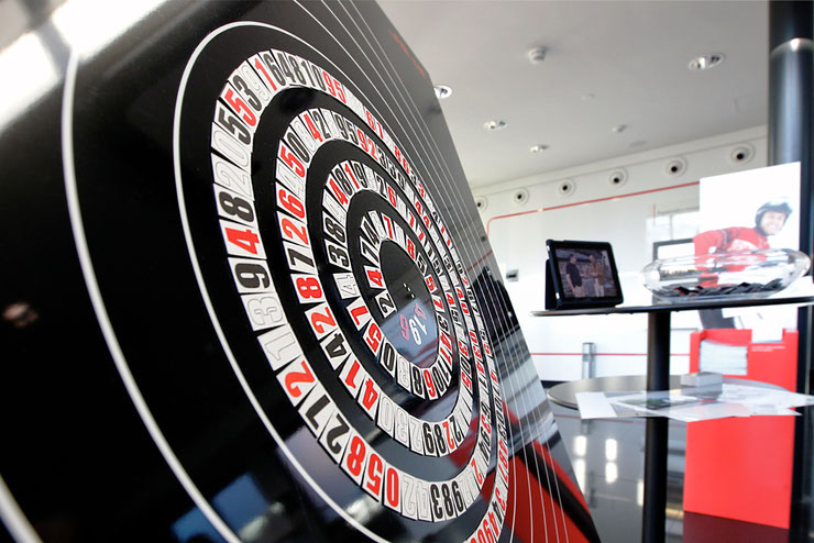 Detail view of the concentric numerical spiral by Paolo Grassi installed at UBS SA, Ascona