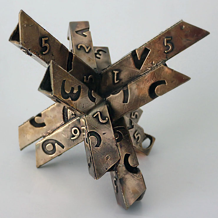 Top view of Paolo Grassi’s bronze sculpture Rigoberta, showing the dynamic structure of numbered elements in the From “0” to Infinity project