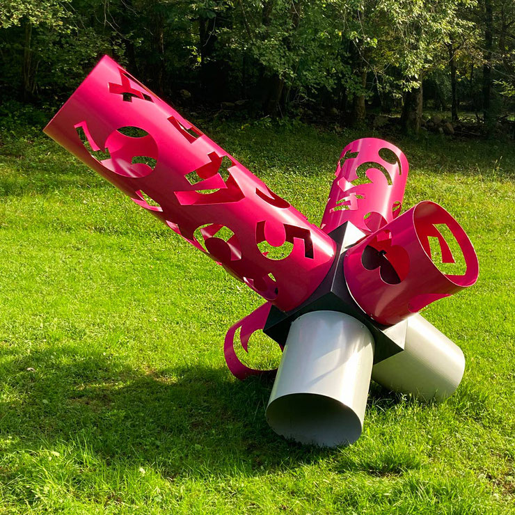 paolo grassi pink panther sculpture lateral view with numeric geometry and pink cylinders in outdoor setting