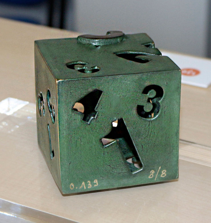 Green patina version of Paolo Grassi’s Dado sculpture in bronze, numbered 8 of 8, tabletop presentation