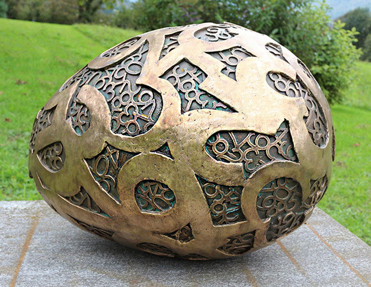 Big Egg sculpture by Paolo Grassi in bronze, featuring numeric surface patterns. Part of the conceptual project From “0” to Infinity.