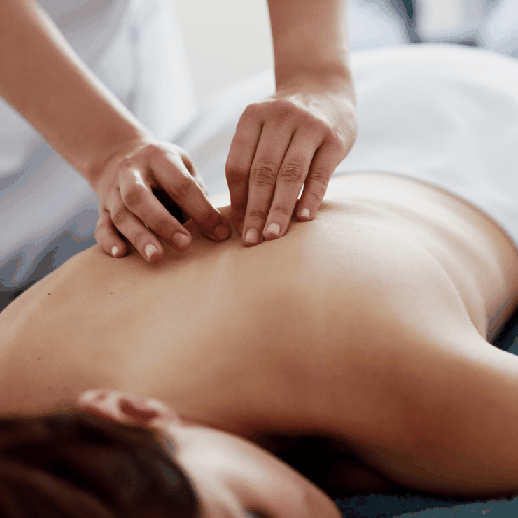 Medizinische Rückenmassage, Hot Stone Massage, Wohlbefinden Wellness Ruhe