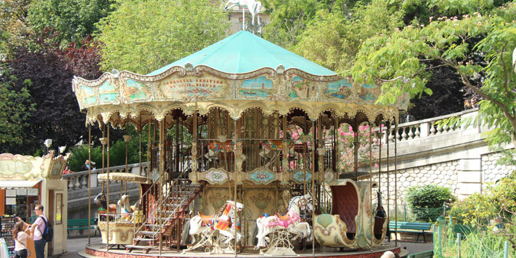 Carousel near Sacre-Coeur With Baby