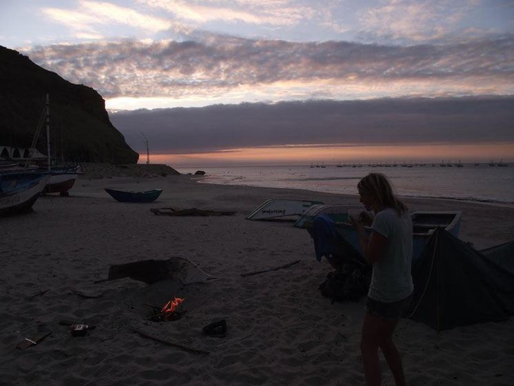Cabo Blanco, Peru- building a cooking fire on the beach.
