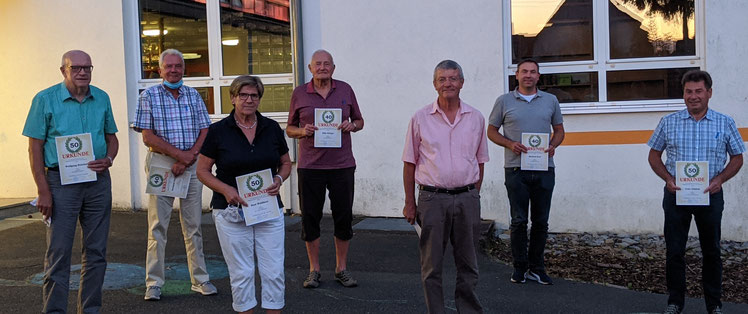 Das Bild zeigt die Geehrten (von links nach rechts): Wolfgang Reinhart, Berthold Fischer,  Rosemarie Waldherr, Eike Grieger, Klaus Neckermann, Michael Graf, Fritz Uihlein.