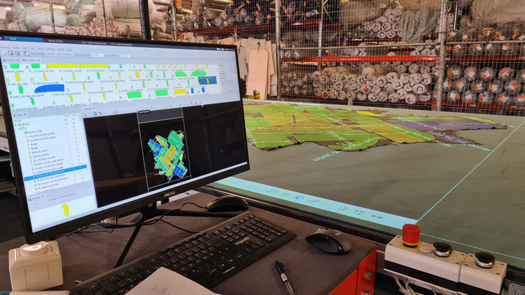 RG Technologies CCUT Zuschnittsystem bei Trendi Holdings: Erfassung - Automatisches Nesting - Schneiden - Absortieren 