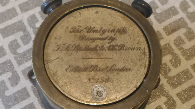 Unigraph telegraph pocket set made by Elliott & Bros. - particular of engraved writeon the top cover