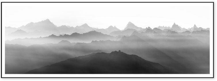 Minimal black and white panorama of alpine silhouettes including Matterhorn and Weisshorn in the eastern Valais Alps
