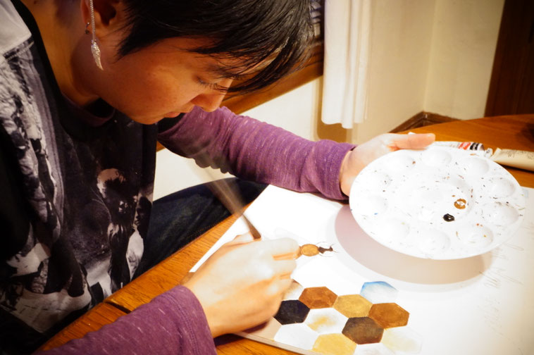 Working on painting in progress. Photo by Yi Zhang (2016)