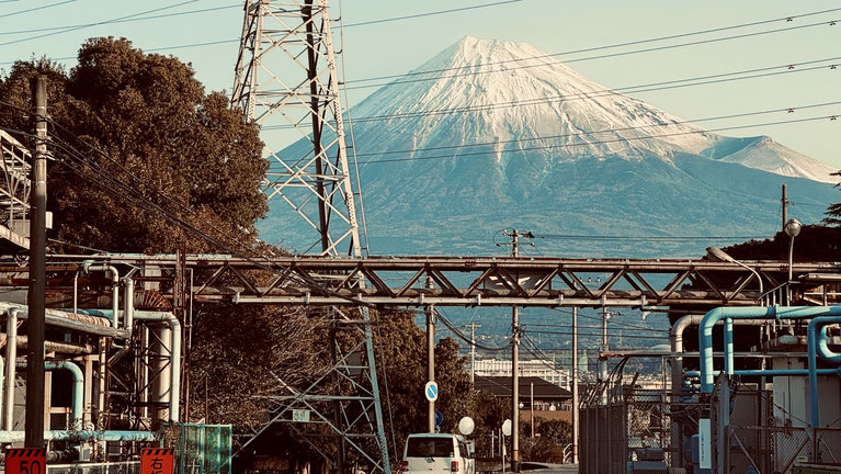 Mt. Fuji rising above the industrial area of Fuji City, Shizuoka