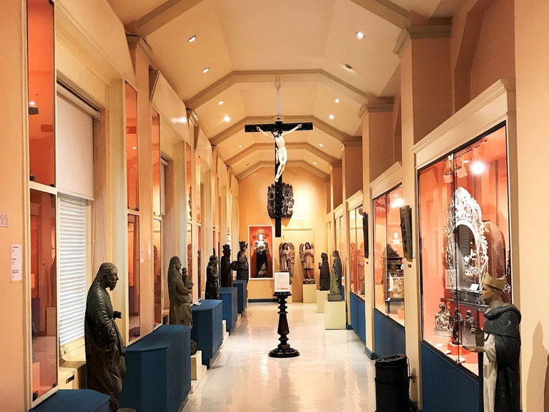 A Large Crucifix inside the Hall of Philippine Religious Images , UST Museum