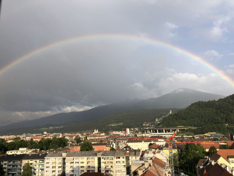 Photo by Irene Huber: Rainbow over Innsbruck