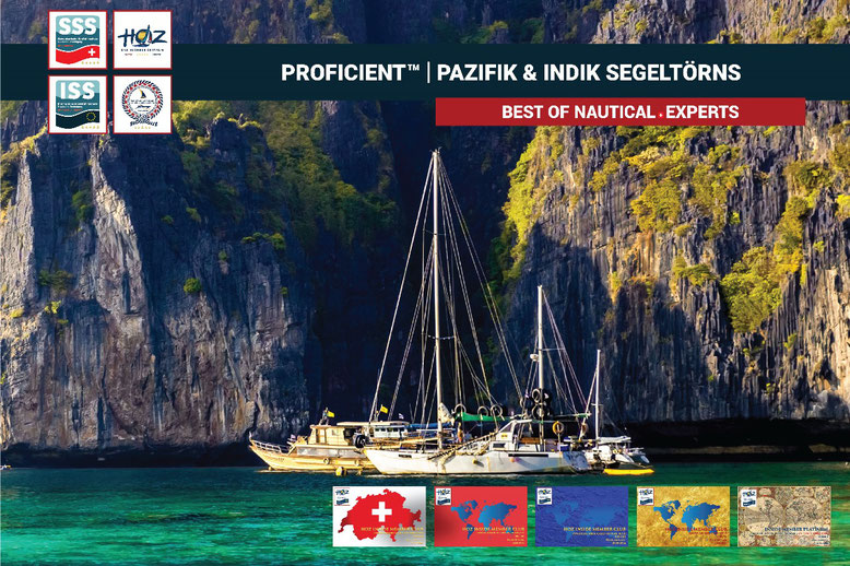Segelyachten im türkisblauen Wasser vor Felsen – Pazifik- und Indik-Segeltörns mit HOZ Hochseezentrum™.
