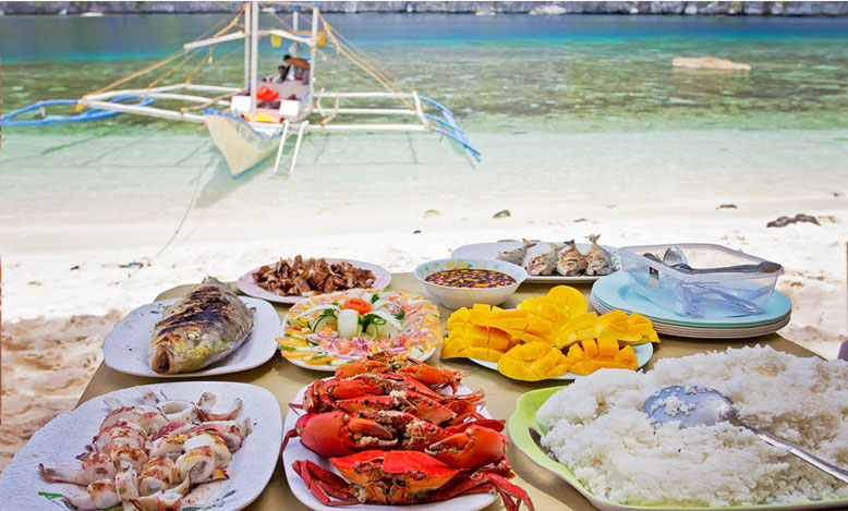 Why not all-day island hopping in the Philippines? With this lunch on a pristine beach? And for $13??