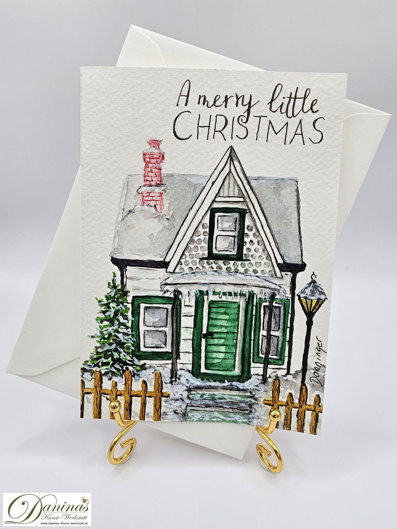 Weihnachtsgrußkarte gemalt Aquarell Haus mit Zaun und "A merry little Christmas"-Handlettering