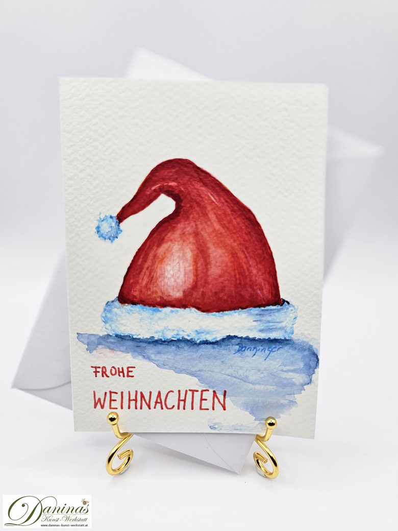 Weihachtsgrußkarte gemalt Aquarell Weihnachtsmann Mütze mit "Frohe Weihnachten"-Handlettering